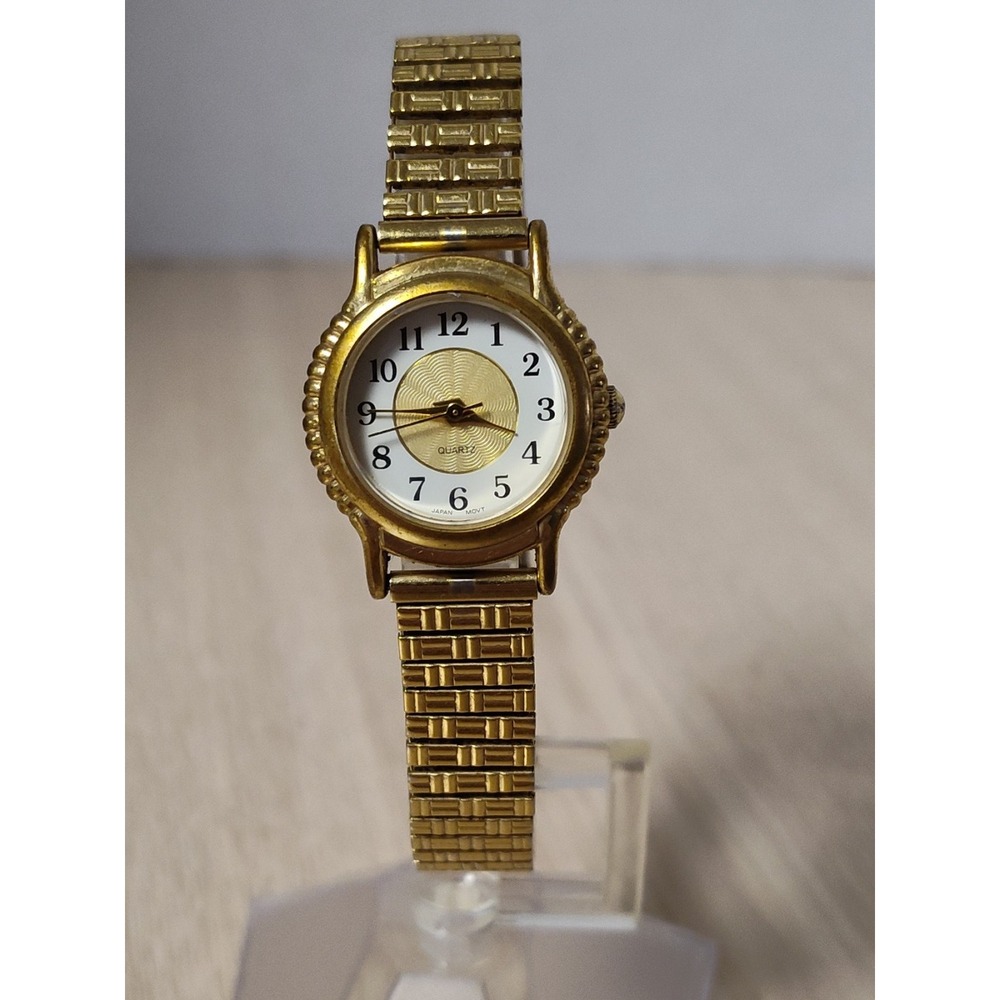 AVON Everyday Stretch Goldtone Watch Ladies Round Dial New Battery